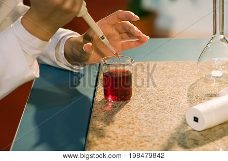 Laboratory technician at work color image selective focus horizontal image