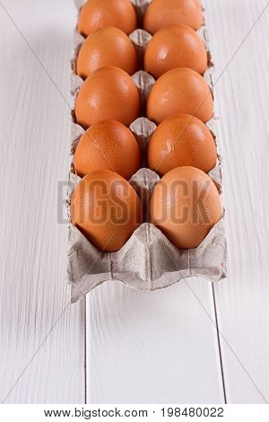 Eggs in the paper tray package on white background.