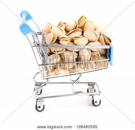 Pistachio in a shopping cart isolated on white background.