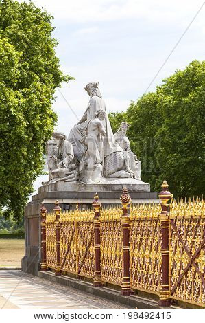 LONDON UNITED KINGDOM - JUNE 23 2017:Prince Albert Memorial Kensington Gardens sculpture at the base of the monument London United Kingdom. It was commissioned by Queen Victoria in memory of her husband opened in July 1872