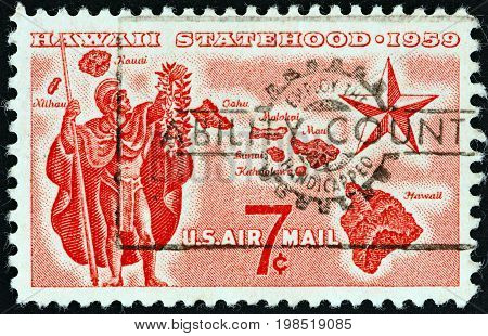 USA - CIRCA 1959: A stamp printed in USA issued for the Hawaii Statehood shows Alii Warrior, Map of Hawaii and Star of Statehood, circa 1959.