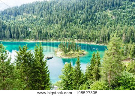 Caumasee in Switzerland lake with turquoise water for hiking and swimming