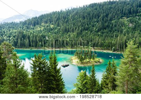 Caumasee in Switzerland lake with turquoise water for hiking and swimming