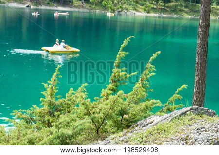 Caumasee in Switzerland lake with turquoise water for hiking and swimming