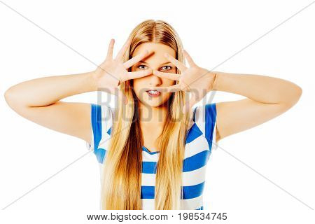 Woman covering her face with her hands.