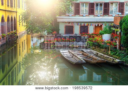 Beautiful colorful traditional french houses on the side of river Lauch in Petite Venise Colmar France Europe