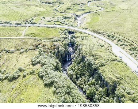 Aerial of the beautiful Lealt Falls - Isle of Skye - Scotland, United Kingdome