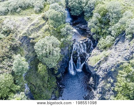 Aerial of the beautiful Lealt Falls - Isle of Skye - Scotland, United Kingdome