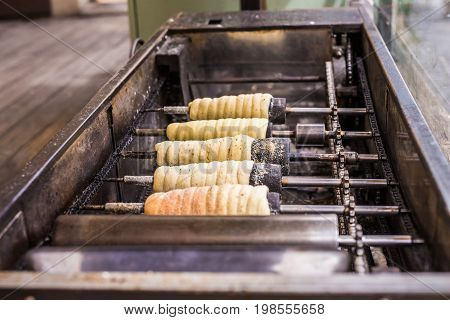 Trdelnik - traditional Czech hot sweet pastry sold in the streets of Prague