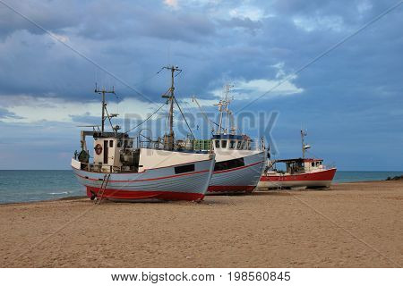 Fishing boats at Thorup Beach Denmark. Jammerbugten.