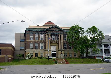 CADILLAC, MICHIGAN / UNITED STATES -  MAY 31, 2017: The historic Wexford County Courthouse, with its impressive columns, is near downtown Cadillac.