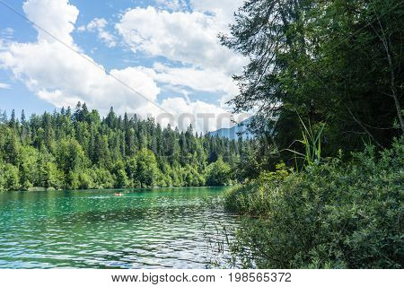 crestasee with mountain and forest view in flims switzerland