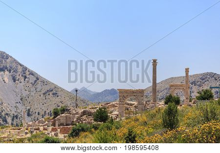 Ancient city Sagalassos with arches and columns in mountains