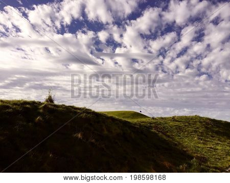 Golf Course Flag on Top of Sand Dunes.
