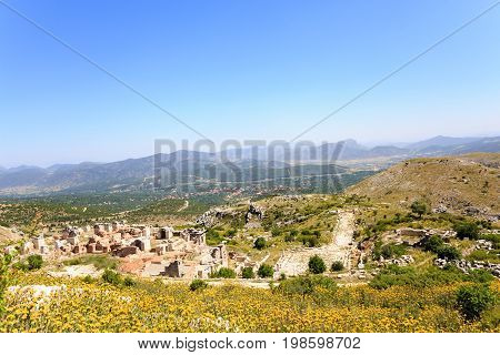 view of ancient city of Sagalassos with mountains on background