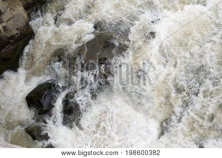 Stones Interfere With The Small River Quietly A Leak