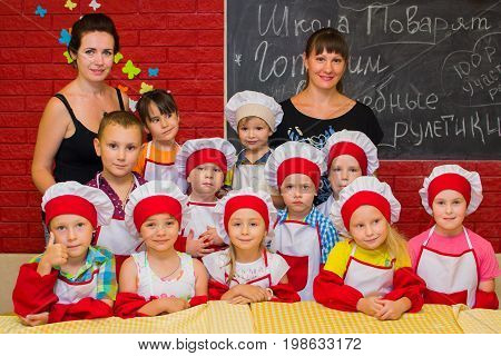 Alchevsk, Ukraine - July 23, 2017: School Cook For Children. Meat Rolls With Cheese Are Prepared.