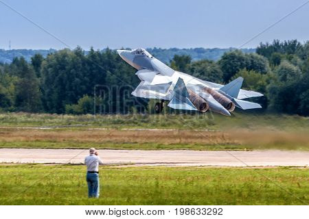 Moscow Region - July 21, 2017: New Russian fifth-generation fighter T-50 (Sukhoi PAK FA) takes off at the International Aviation and Space Salon (MAKS) in Zhukovsky.