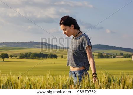 Happy beautiful woman in meadow. Freedom concept background.