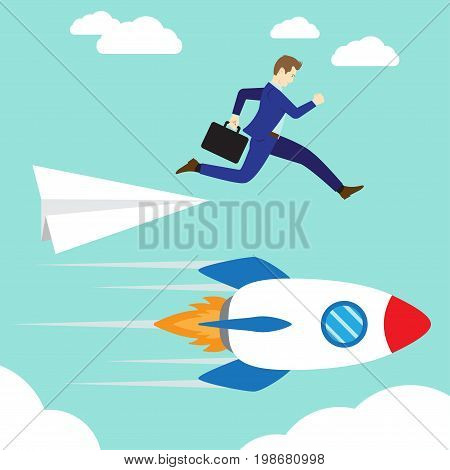 Business Concept As A Businessman Is Jumping Down From A Paper Rocket To A Rushing Real Rocket. It Means Changing From Fragile/Weak/Unreliable Method Way Standard To The Sturdy/Stable/Strong One.