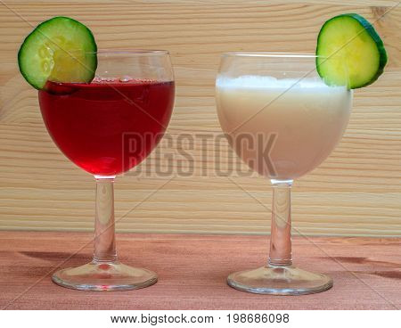 Wine and milk on a wooden background