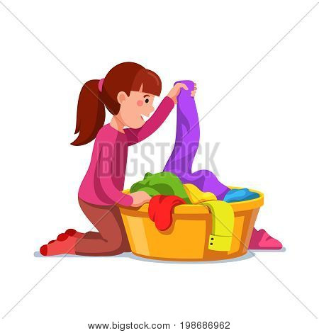 Little girl kid doing housework chores sorting dirty laundry in clothes basin. Flat style character vector illustration isolated on white background.