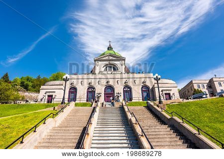 Montreal Canada - May 28 2017: St Joseph's Oratory on Mont Royal with pilgrim prayer steps in Quebec region city