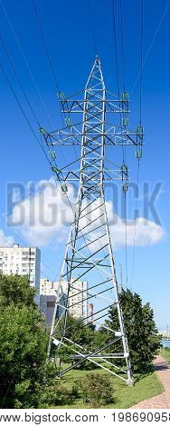 High-voltage Supports With A View Of The Blue Sky