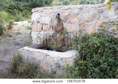 Source on the road to Los Almorchones. Becerril de la Sierra. Madrid's community. Spain