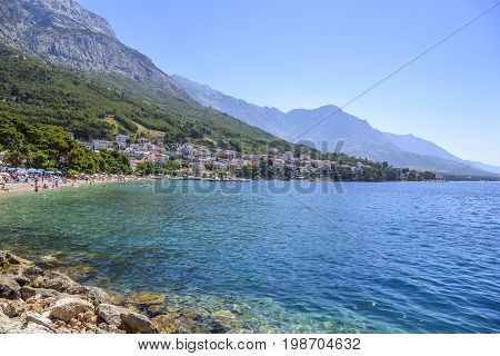 BRELA, CROATIA - 6 JULY, 2017: View of the coastline of the beaches in the resort town of Brela in Croatia.