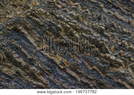 A background made out of a mountain that has had a slide