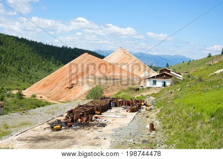 Destroyed building mines in the Altai Mountains. Republic of Altai, Siberia, Russia.