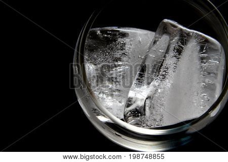 Ice Block / An ice cube is a small, roughly cube-shaped piece of ice, conventionally used to cool beverages