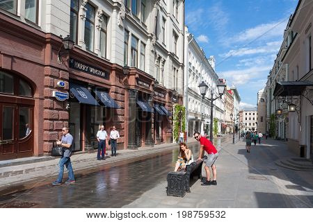MOSCOW - AUGUST 7: People in Stoleshnikov Lane on August 7 2017 in Moscow. Stoleshnikov lane is pedestrian street in the center of Moscow.