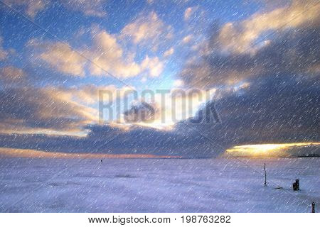 Fisherman On The River Covered With Ice