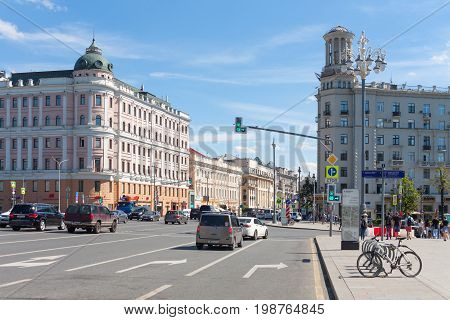 MOSCOW - AUGUST 7: Logunov apartment house (left) and residential house (right) on Tverskaya Street on August 7 2017 in Moscow. Tverskaya Street is located in the center of Moscow.