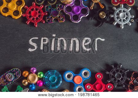 A Lot Of Different Spinners On A Black Background And The Inscription Spinner