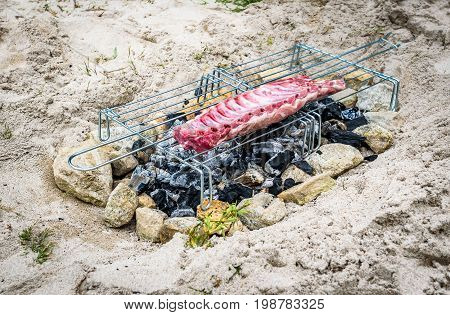 Making Pork Ribs On Homemade Improvised Bbq Barbecue Grill.