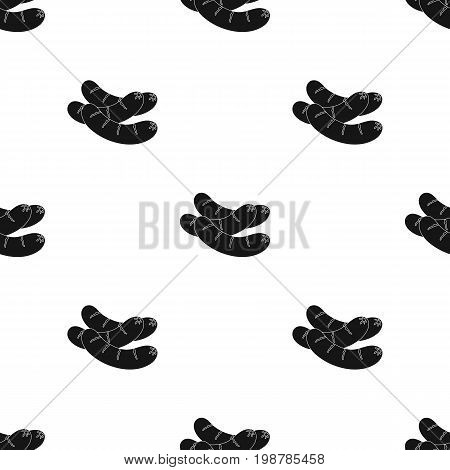 Grilled sausages.BBQ single icon in black style vector symbol stock illustration .