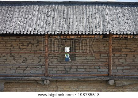 A fortified wall with battlements. Pskov Krom (Kremlin). Russia.