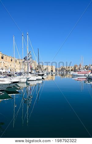 VITTORIOSA, MALTA - MARCH 31, 2017 - View of Senglea and Vittoriosa marina and waterfront buildings with Senglea to the left and Vittoriosa to the right Vittoriosa Malta Europe, March 31, 2017.