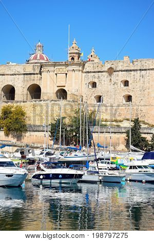 VITTORIOSA, MALTA - MARCH 31, 2017 - View of Senglea marina and waterfront buildings seen from Vittoriosa Vittoriosa (Birgu) Malta Europe, March 31, 2017.