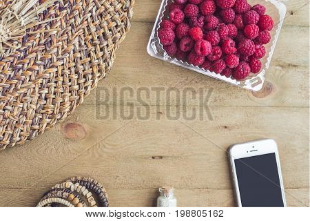 Summer Holiday, Vacation, Relaxation Concept. Raspberries, Straw Hat, Smartphone, Sunglasses From Ab