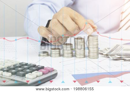 Saving money concept preset by Male hand putting money coin stack growing business concept in grow and walk step by step for success
