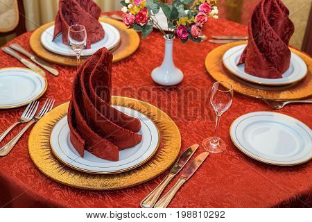 Big table at retaurant served for upcoming banquet