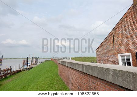 the small village of ditzum at the river ems