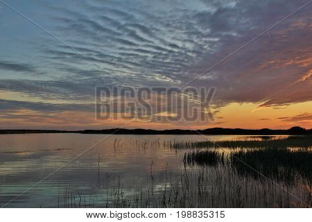 Moody sky at Gronnestrand Denmark. Sunset at the Jammerbugten.