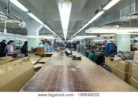 MOSCOW, RUSSIA - FEBRUARY 21, 2017: Moscow shoe factory JSC RALF RINGER. Shop processing of leather blanks.