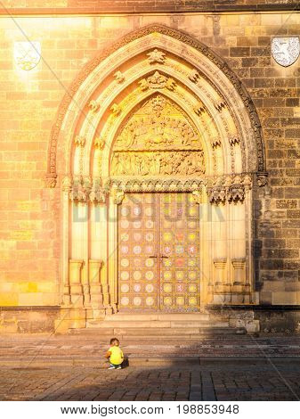 Gothic style entrance portal of Basilica of Saint Peter and Paul in Vysehrad, Prague, Czech Republic.