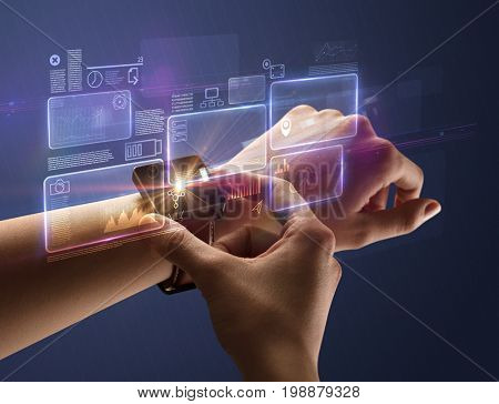 Female hand wearing smartwatch with statement labels around and dark background